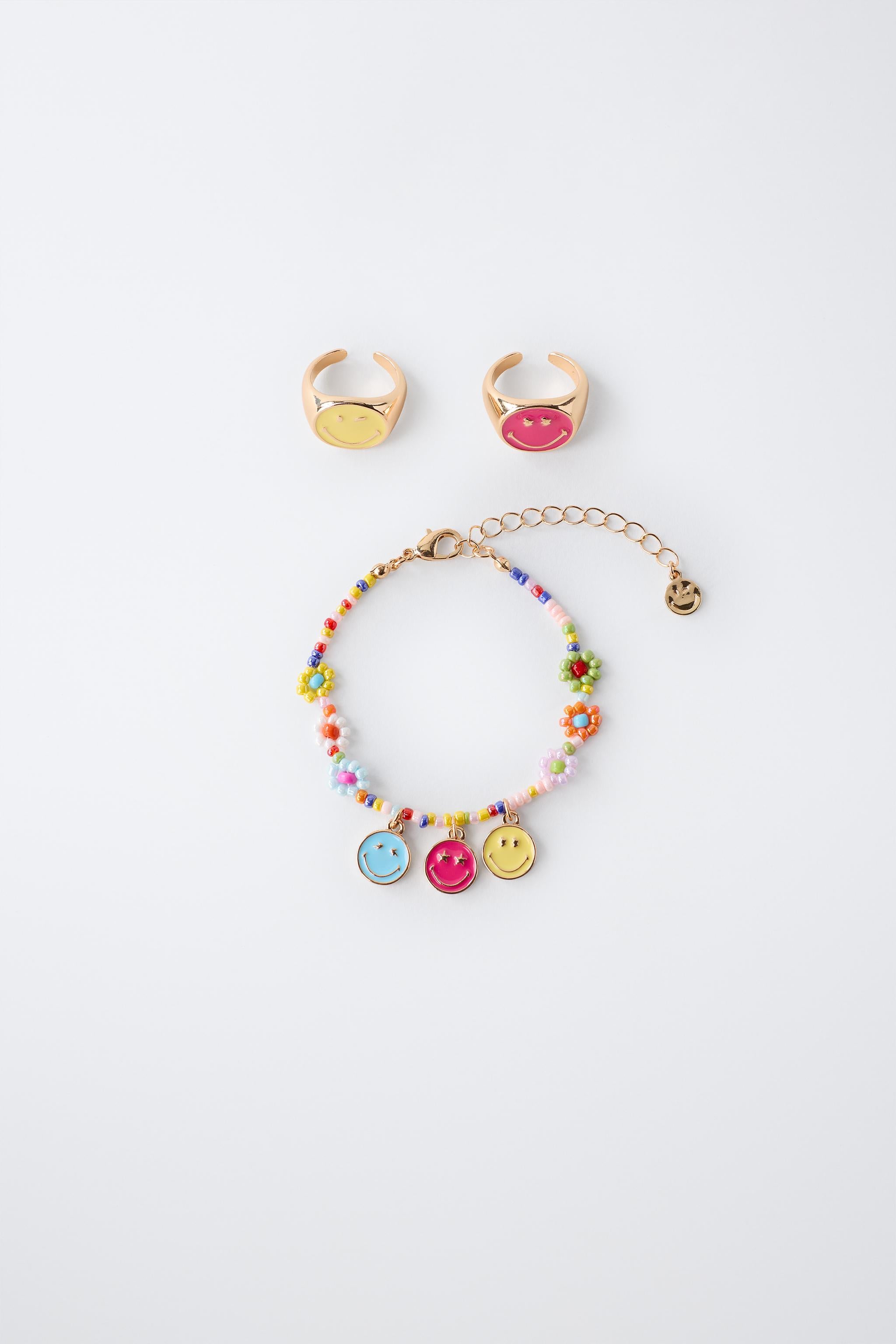 SMILEYWORLD ® PACK OF RINGS AND BEADED BRACELET