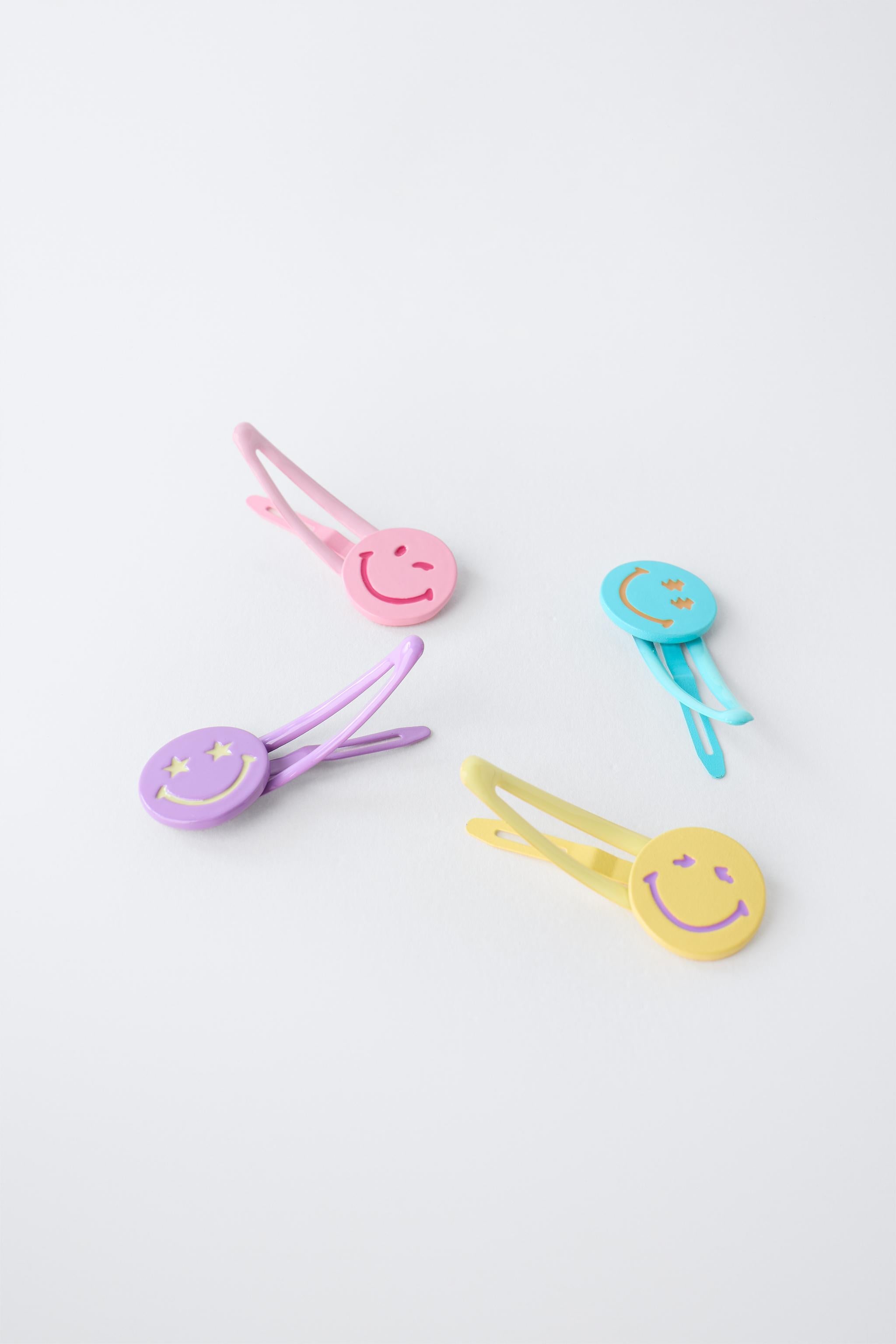 FOUR-PACK OF SMILEYWORLD ® HAIR CLIPS