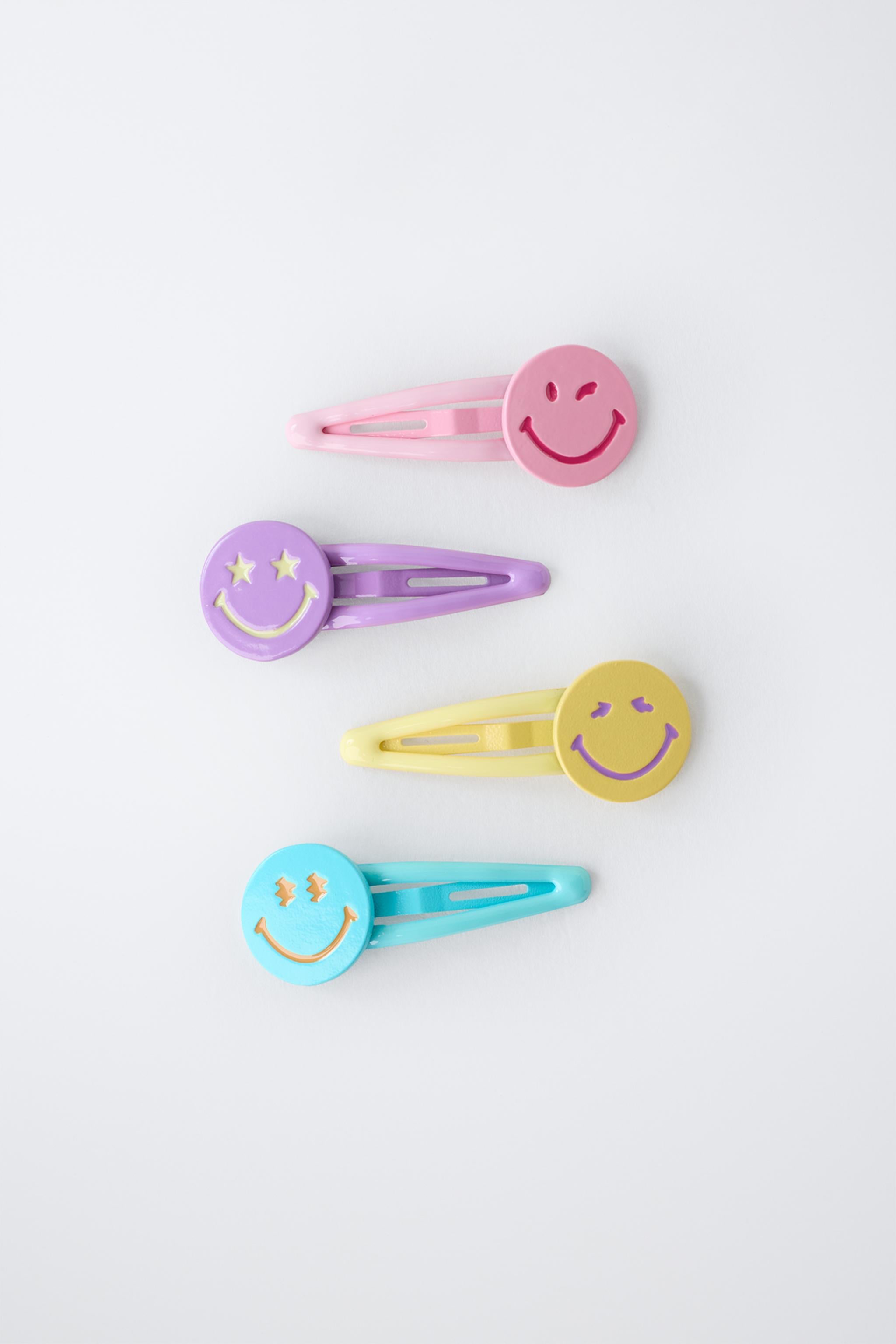 FOUR-PACK OF SMILEYWORLD ® HAIR CLIPS