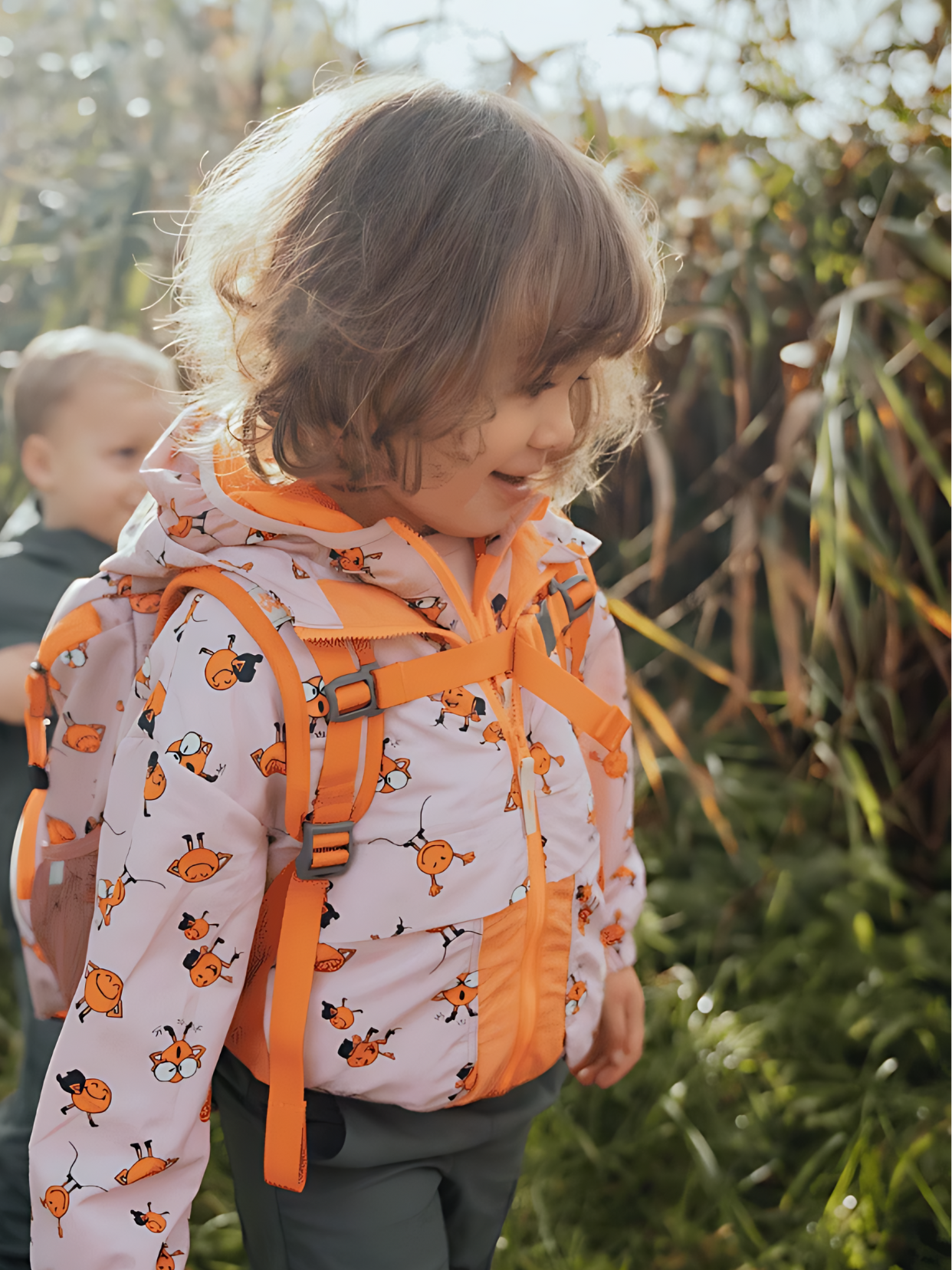 Little girl in Jack Wolfskin x SmileyWorld