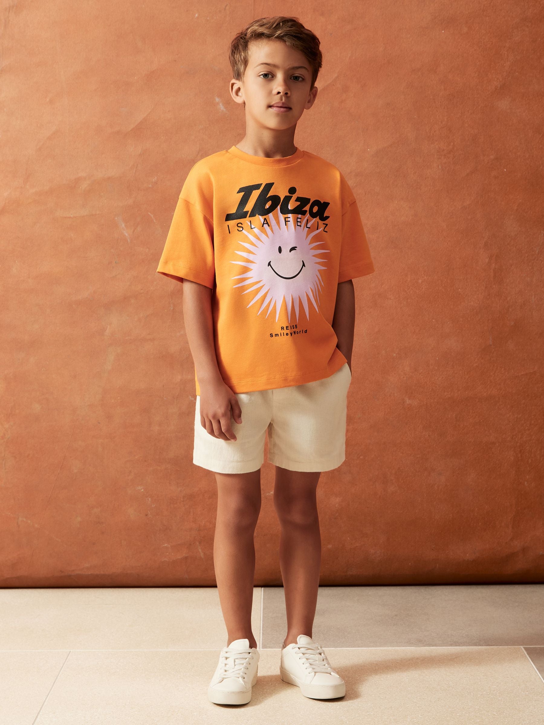 SmileyWorld | Reiss Sun Motif T-Shirt in Orange