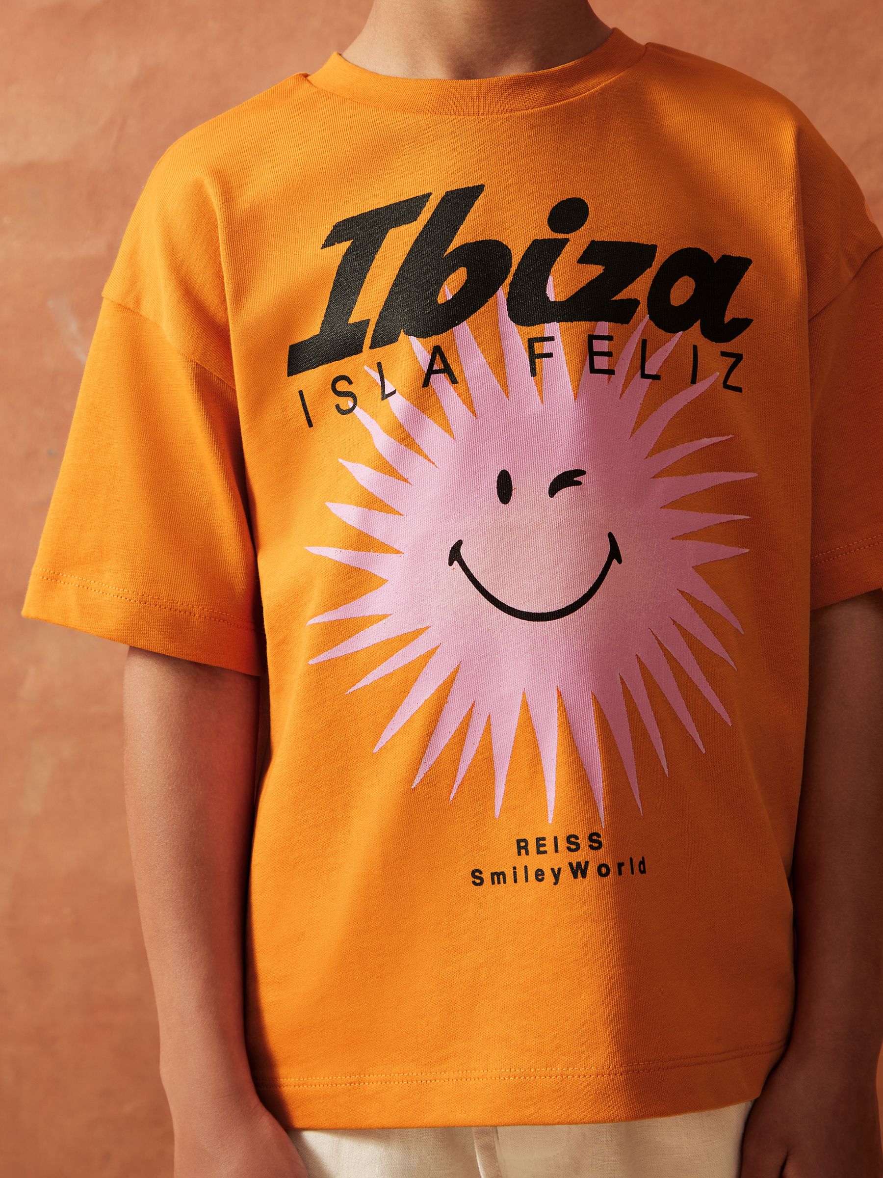SmileyWorld | Reiss Sun Motif T-Shirt in Orange