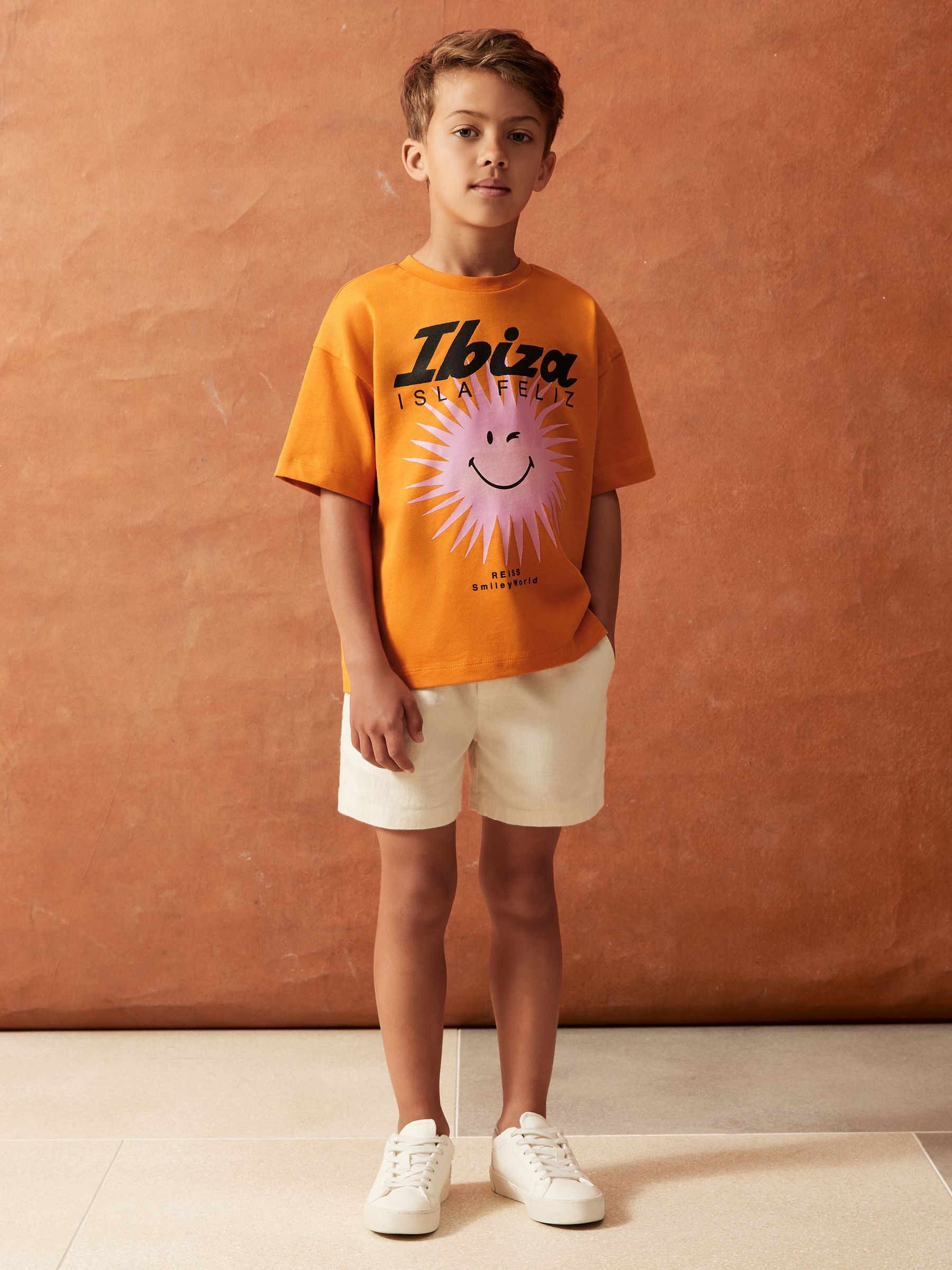 SmileyWorld | Reiss Sun Motif T-Shirt in Orange