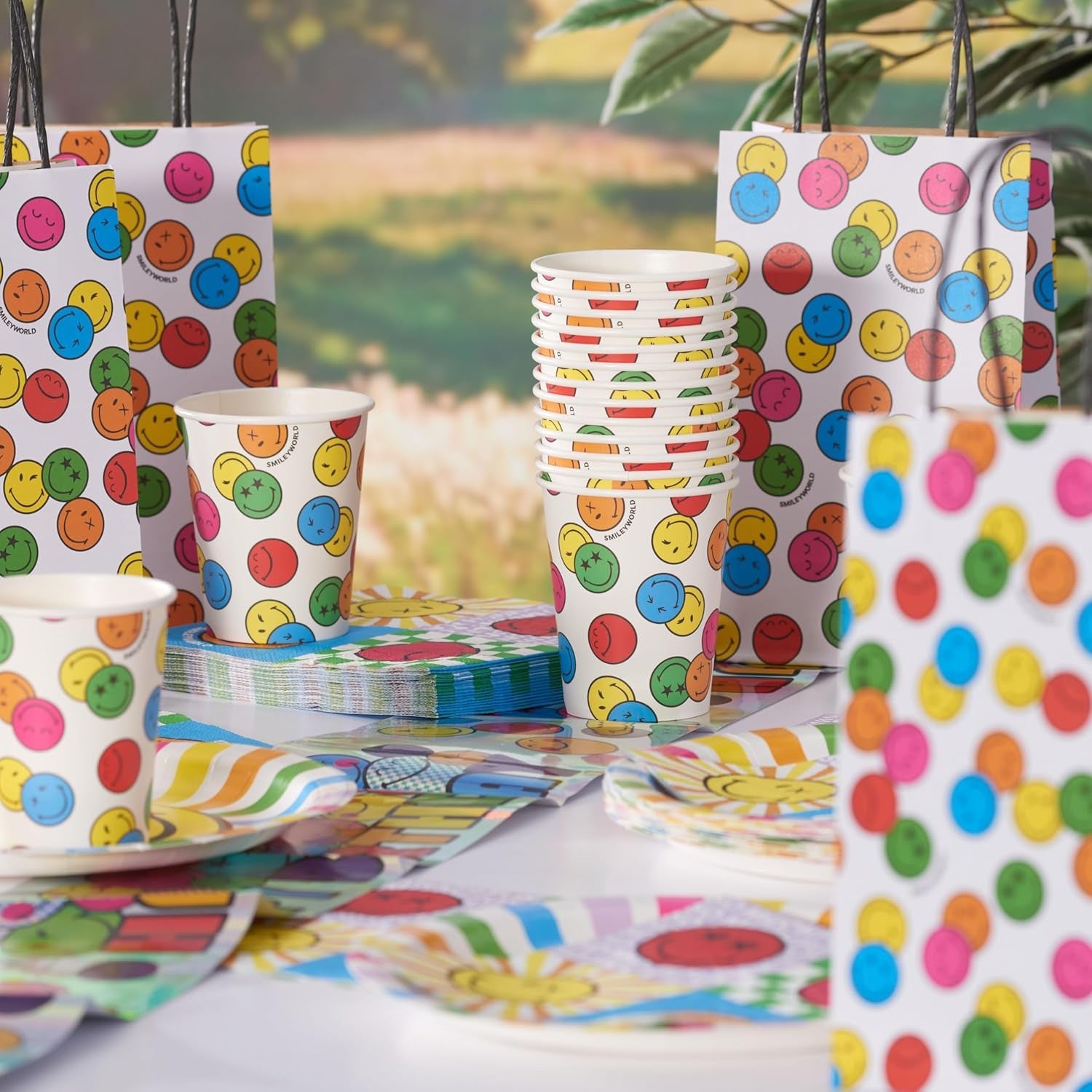 UK Greetings | Party Assortment Bundle | 16 Paper Plates & Cups, 16 Paper Bags, 40 Napkins, 1 Banner | Smiley World Design